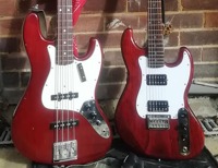 My beloved Tokai Jazz Bass, and the Fender 66 shaped six string I created to partner it.